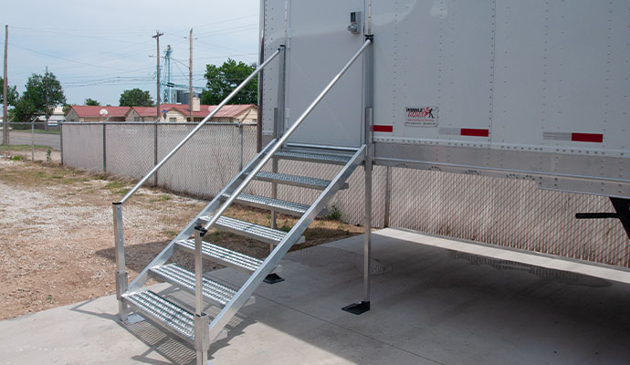 Industrial open-grate aluminum staircase