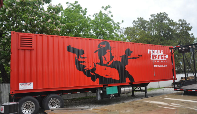 Shipping container mounted on a flatbed trailer