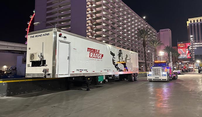 Mobile shooting range trailer at night