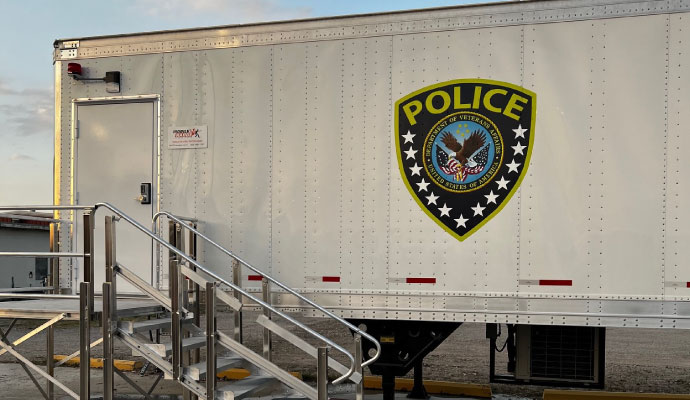 Police department mobile shooting range trailer with entry stairs for law enforcement training