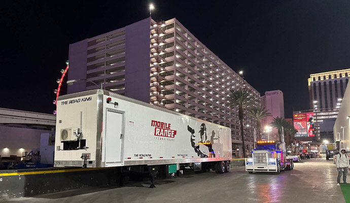 Mobile shooting range trailer at night