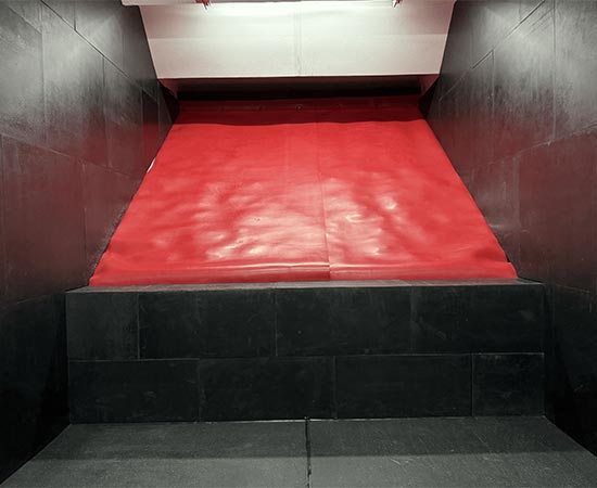 Red bullet trap in an indoor shooting range