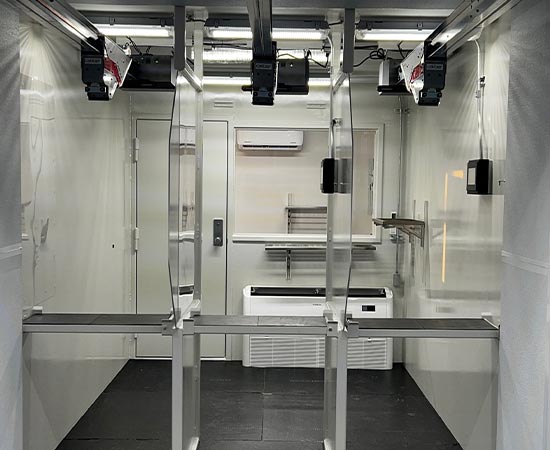 A symmetrical interior view of the firing line in the Road King mobile range